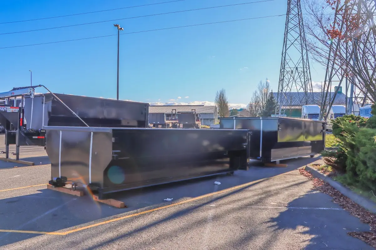 Roll-off dumpster ready for waste disposal at job site for 15 Yard Dumpster Rental in Sans Souci